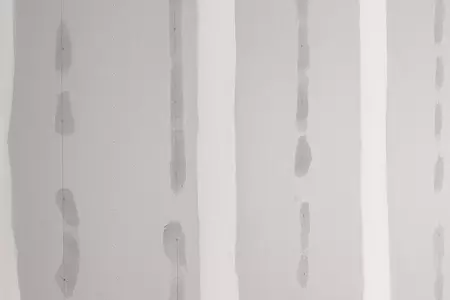 Guide - How to applying filler to a plaster wall